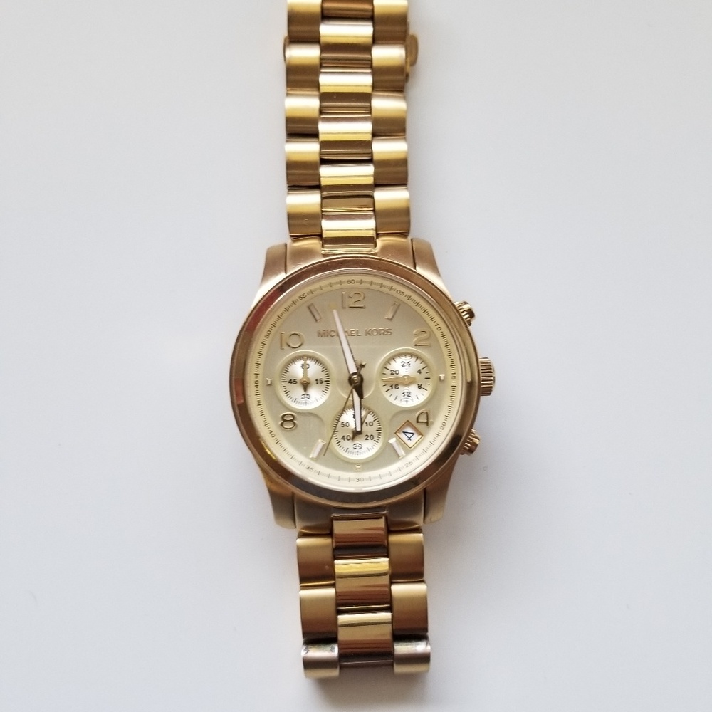 Michael Kors gold tone watch, women's